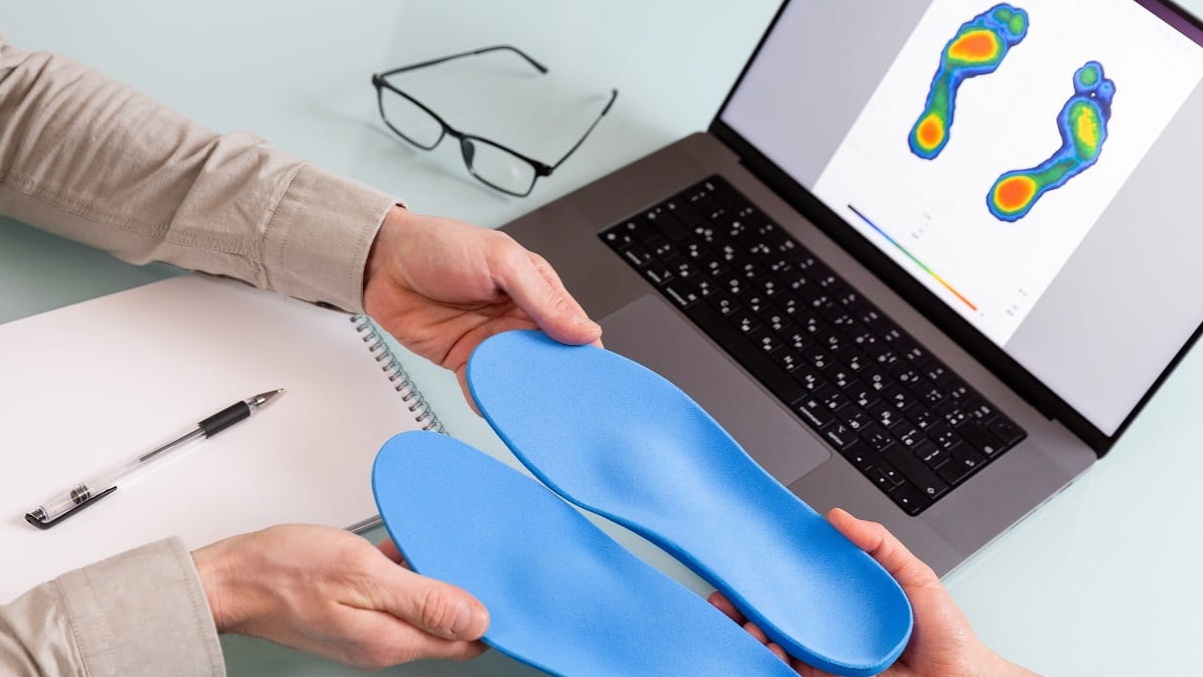 Custom made insole and foot pathology